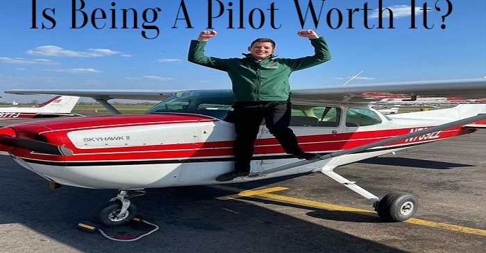 Private Pilot standing on airpane who passed his checkride.
